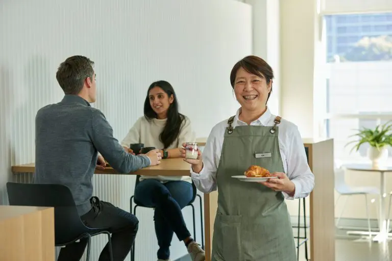 someone serving food in the workplace